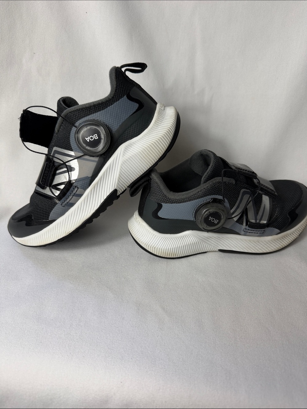 New Balance Kids Black and Gray Slip-On Sneakers